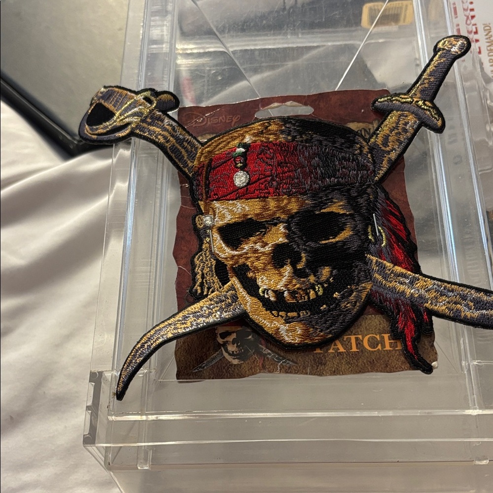 Disney Skull and Swords Patch with Red and Gold Brand New